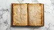 © Ilmi - Old opened book with blank pages on white marble background. Top view. Mockup old book