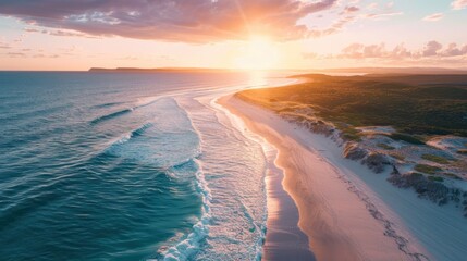 Aerial view of coastline and white sand dunes at sunset. Anna Bay, New South Wales, Australia 