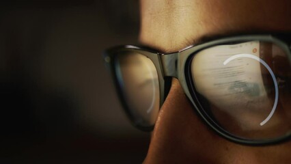 Poster - The search for information on the Internet is reflected in glasses on a male face, and animated footage with a symbol of permanent work appears on the glasses. AI implementation concept. Cg