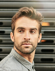 Poster - Outdoor, face and man in fashion, thinking and morning in city, ideas and planning to travel or explore. Wall background, tourist and person with confidence in trip, wondering and street of New York