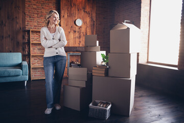 Poster - Photo portrait of lovely retired woman crossed arms look stack boxes wear casual clothes cozy home interior living room in brown warm color