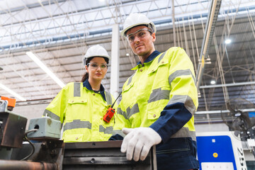 professional business industry technician wearing safety helmet working to maintenance service and checking factory equipment, a work of engineer occupation in manufacturing construction technology