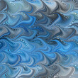 wavy paper marbling effect in blue, gray, black and white