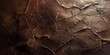 Detailed view of a cracked leather surface, emphasizing textures and aged material