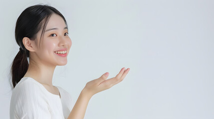 Aufkleber - Happy Asian woman presenting or showing open hand palm with copy space for product on white background : Generative AI