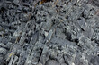 detail of natural volcanic basalt stone cliff in Iceland