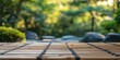 A tranquil image focusing on bamboo mats with a soft blurry background of a lush green garden bathed in sunlight