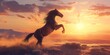 A solitary horse rears up majestically against a dramatic sunset sky, evoking freedom and wild beauty on the plains
