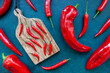Fresh spicy chili peppers and paprika top view