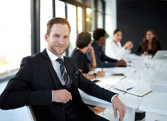 Poster - Meeting, portrait and businessman in boardroom with business people, confidence or leadership. Conference room, men and women together in conversation for planning, strategy or b2b workshop at office