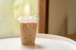 Iced coffee in a plastic cup. Coffee drinks with a strong flavor and high caffeine.