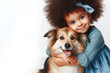 A beautiful afro baby lovingly embraces her pet dog isolated on a white background