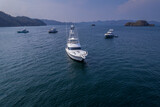 Fototapeta Natura - Beautiful aerial view of an impressive fishing luxury yacht in the Tortuga island in Costa Rica