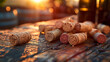 Harvested corks bask in golden hour radiance on a vintage tabletop
