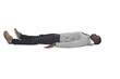  view oa a man lying on the floor eyes closed on white background