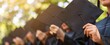 A closeup of the hands and gowns of students holding their black square-shaped graduation caps, symbolizing success in education Generative AI