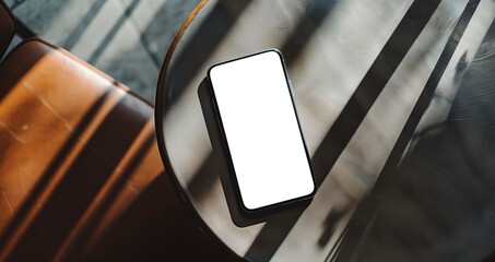 smartphone on the table in a restaurant or cafe with its transparent screen - easy modification