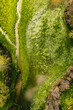 Vue sur un petit ruisseau, dans le paysage du bocage bressuirais dans le département des Deux-Sèvres vu  depuis un drone