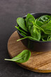 Fresh green spinach leaves in the bowl. Natural vegetarian food.