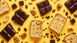 assorted confectionery and baked goods with chocolate on vibrant yellow background