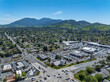 Drone photos over the Clayton Valley Shopping Center in Clayton, California on a beautiful Spring Day with a blue sky