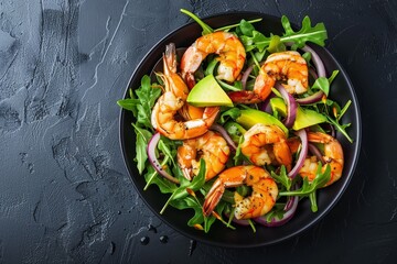 Wall Mural - Prawn and shrimp salad with arugula avocado red onion and almonds Healthy and top down view