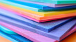 A stack of colorful craft foam sheets for DIY projects.