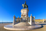 Fototapeta Uliczki - The equestrian statue of King Joseph I of Portugal, on a sunny day at the waterfront Praça do Comércio, the main large, central square in Lisbon, Portugal.
