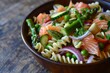 Pasta salad with asparagus peas red onion cucumber and smoked salmon leftovers