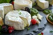 © LimeSky - Assortment of fresh goat cheeses with herbs berries and pesto