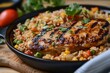 Chicken steak and vegetables served with Mexican rice