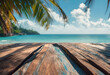 Wooden deck overlooking a tropical beach with palm leaves, clear blue sky, and turquoise sea.