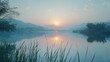 A serene sunrise over a calm lake with mountains in the distance and reflection on water, conveying peace and stillness in natural surroundings