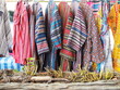 Hill tribe style clothes. Brightly colored hand-woven long-sleeved shirt and beautifully patterned sarongs are sold at the souvenir center. Beautiful patterned fabric woven by hill tribes in northern 