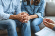 © NaLan - Couple hold hand support each while discussing family issues with psychiatrist. Husband encourages and empathy wife suffers depression. psychological, save divorce, Hand in hand together, trust, care