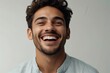 young hispanic man on plain bright white background laughing hysterically looking at camera background banner template ad marketing concept from Generative AI
