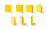 Fototapeta Tęcza - Set of yellow shopping bags from different sides. 3d render