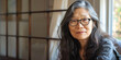 portrait of an Asian woman in her fifties with long hair and glasses, generative AI