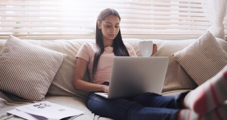 Sticker - Sofa, thinking and woman with laptop for remote work, relax and coffee for online paper. Documents, reading and freelancer girl in home with computer for web project, research job and drink on couch.