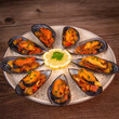 RECIPE FOR SPANISH MUSSELS WITH CHORIZO, WHITE WINE SAUCE, PEPPER, TOMATO, ONION. High quality photo