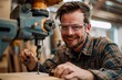 © pawimon - Craft work A happy wood working enthusiast, donning safety glasses, showcases his skills by confidently drilling into wooden boards, for business and workshop