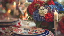 Independence Day, The Fourth Of July Patriotic Table Setting With American Flag Colors. Beautiful Hydrangea Bouquet In Red Blue White
