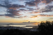 Sunrise at Mt Eden summit. Rangitoto Island in the distance. Auckland.