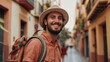 Portrait of happy handsome hipster man with backpack in Spanish city. Solo traveling, digital nomads lifestyle. Young tourist enjoy holiday vacation in sunny day