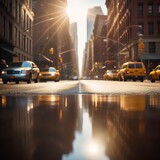Fototapeta  - Yellow cab crossing a street in the downtown of Manhattan New York City. United states of America