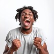 Young man with dreadlocks celebrating enthusiastically.