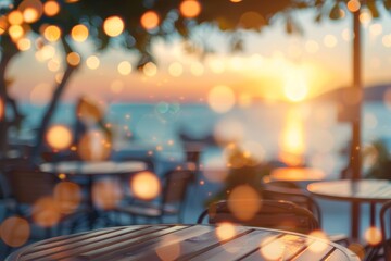 Wall Mural - Blurred outdoor restaurant terrace at sunset near the sea with bokeh Vacation concept