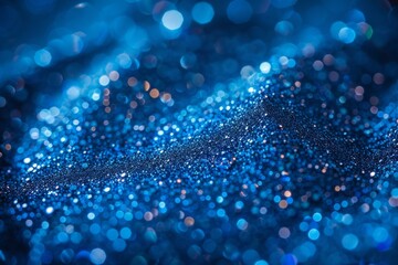 Poster - This image captures a stunning visual of countless sparkles in varying shades of blue on a dark backdrop, resembling a starry night