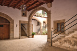 Fototapeta  - A beautiful courtyard - a backyard, accessed by a gate