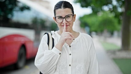 Sticker - Young beautiful hispanic woman woman smiling asking for silence at street